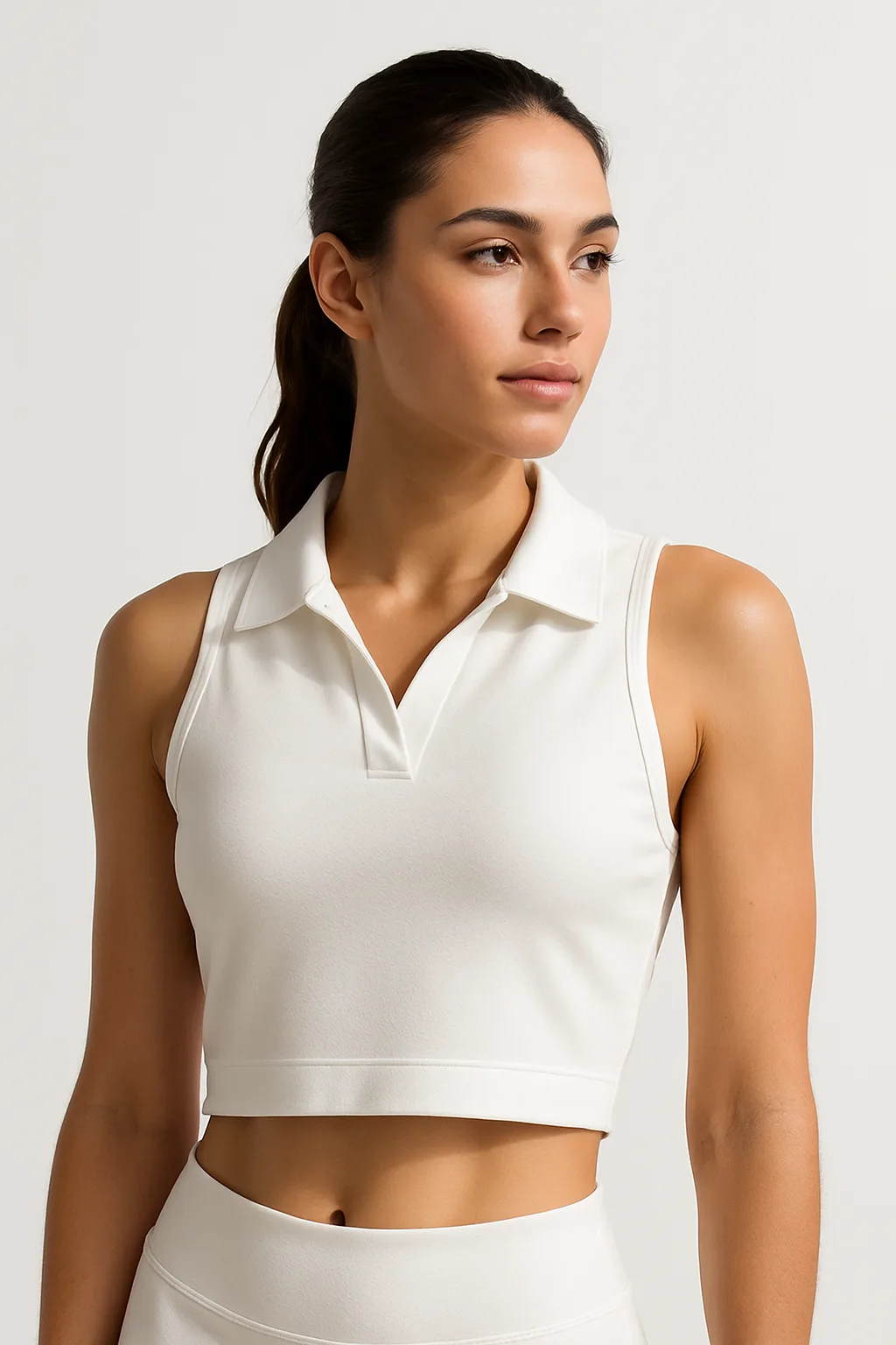 20250818_1631_White Cropped Sports Polo_simple_compose_01k2zahzmge45bfewmkjhxfwxs